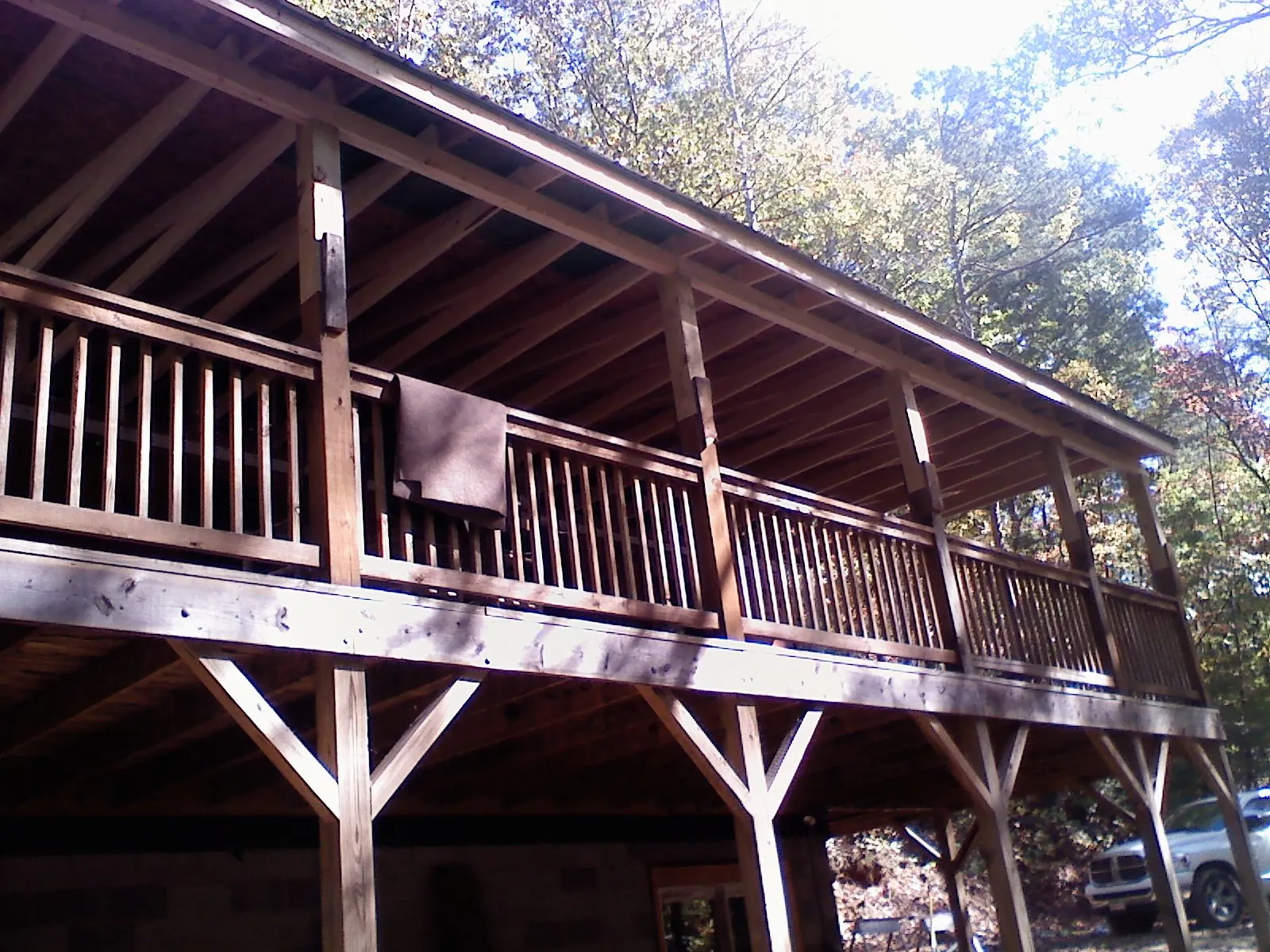 Timber framing under a new elevated porch and deck — Roof Leak Repair in Blue Springs by Roofing Brothers